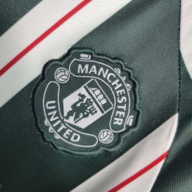 Kit Infantil Manchester United II 23/24